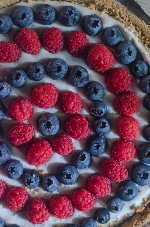 This 4th of July coconut cream pie is the epitome of a delicious summer dessert! It is light, creamy and full of fresh berries. Gluten-free, vegan, dairy-free.