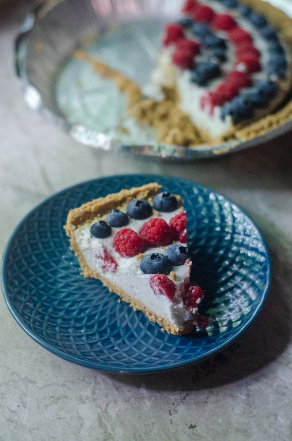 This 4th of July coconut cream pie is the epitome of a delicious summer dessert! It is light, creamy and full of fresh berries. Gluten-free, vegan, dairy-free.