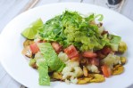 Whole30 compliant plantain chip nachos made with fresh plantains. Tons of guacamole, veggies and ground meat top these nachos. Paleo, dairy-free, gluten-free, grain-free, corn-free.