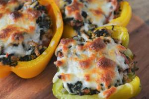 Super-easy Italian stuffed peppers. Filled to the brim with ground turkey, spinach, tomatoes and topped with crispy broiled mozzarella cheese. Gluten-free, grain-free, low-carb, ketogenic. 