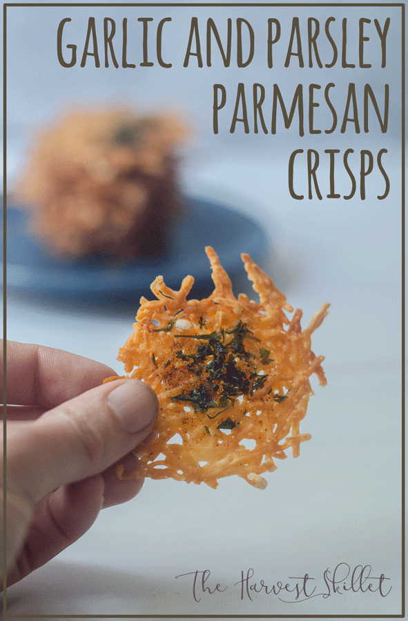 Craving a crunchy snack? These garlic and parsley parmesan crisps are super crispy and salty, and only take a few minutes to bake! Low-carb, keto, animal-based. 