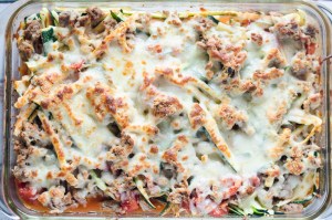 A quick and easy Italian zucchini noodle casserole with tomatoes and ground turkey. Cook the turkey, toss all the ingredients into a dish and cook in the oven! Gluten-free, grain-free, ketogenic, low-carb. 