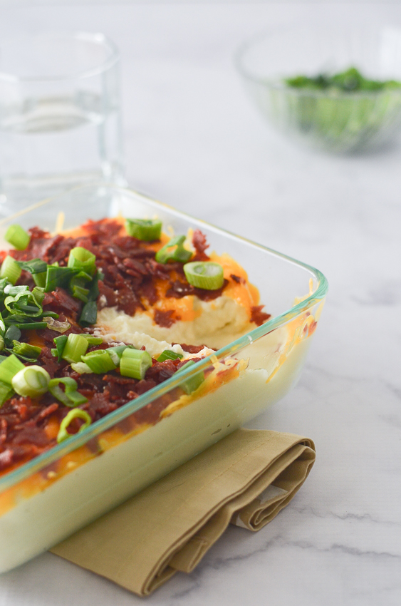 A delicious loaded cauliflower mash that rivals any good mashed potato recipe. Complete with tons of cheddar cheese, generous amounts of crispy bacon and lots of tangy green onions. You will certainly not miss those carb-filled potatoes, and may even impress some of your friends! Nightshade-free, low-carb, ketogenic, gluten-free, grain-free. 