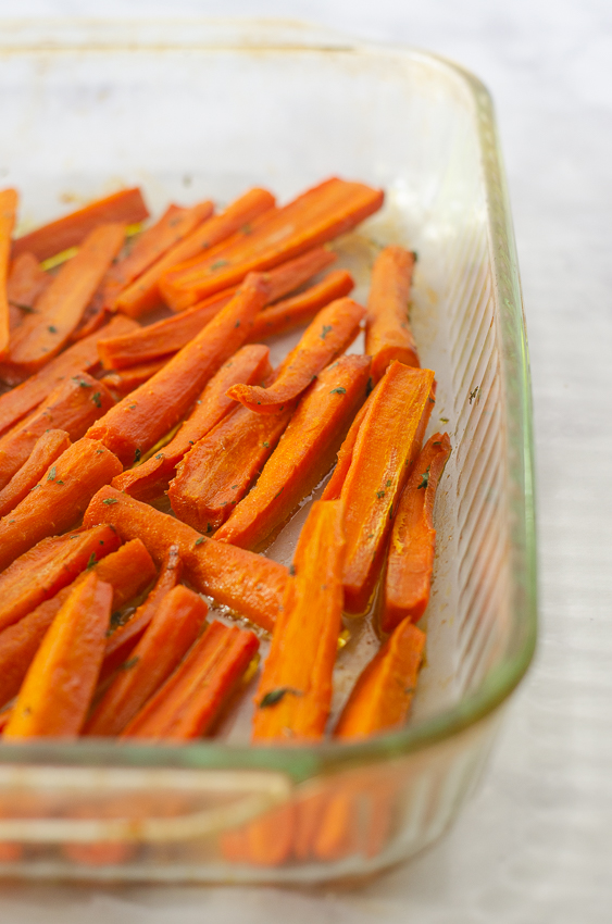 These delicious ghee roasted carrots are both healthy and delicious, a winning combination! Great for those following a paleo or bulletproof diet or on a round of Whole30. Perfect for any dinner ranging from a super-casual BBQ to a formal Thanksgiving dinner!