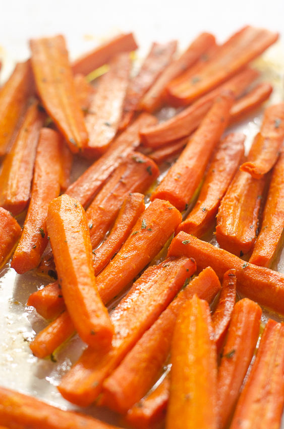 These delicious ghee roasted carrots are both healthy and delicious, a winning combination! Great for those following a paleo or bulletproof diet or on a round of Whole30. Perfect for any dinner ranging from a super-casual BBQ to a formal Thanksgiving dinner!