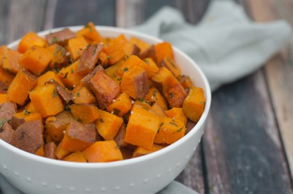 These roasted garlic sweet potatoes are sweet, salty and garlicky, the perfect side dish recipe! Paleo, Whole30, gluten-free, grain-free, dairy-free.