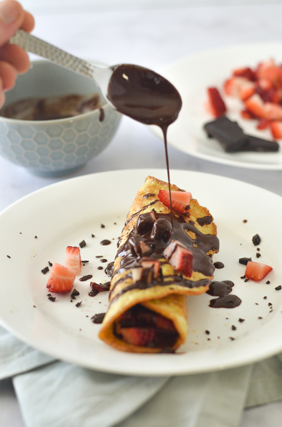 These keto crepes work great in a wide variety of meals. You can make them savory for a main course, or sweet for a breakfast or dessert treat. Super easy to make with just a few simple ingredients. These crepes are made with coconut flour, psyllium husk powder, eggs and water. For dessert crepes, add in your favorite berries and drizzle with melted chocolate. Low-carb, ketogenic, gluten-free, grain-free, dairy-free, sugar-free, Paleo.