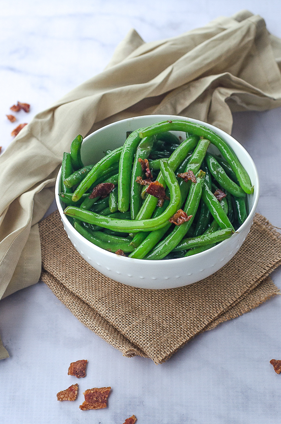 If you're looking for a delicious side dish for any meal ranging from a casual BBQ to a fancy Thanksgiving dinner, then these bacon green beans are perfect! Keto, Paleo, Whole30, gluten-free, grain-free, dairy-free. 