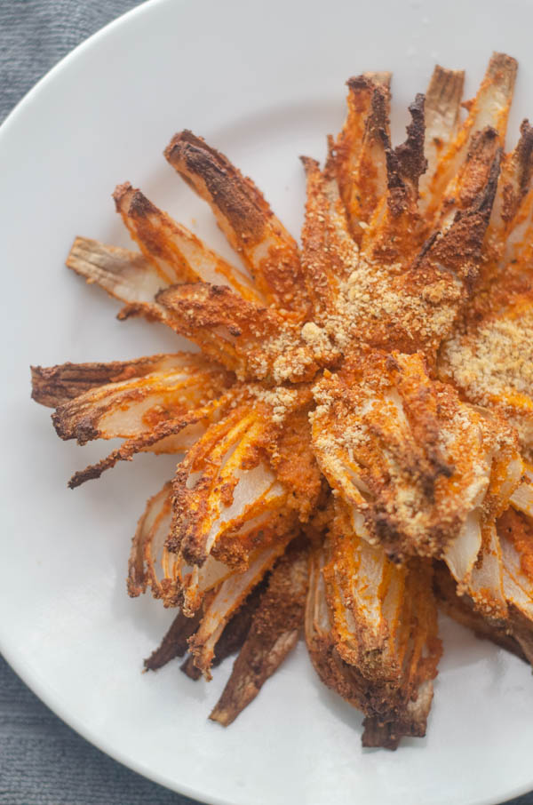 A delicious appetizer for special occasions, this air-fried blooming onion is a much healthier version of a favorite crunchy treat. Paleo, vegan, gluten-free.