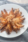 A delicious appetizer for special occasions, this air-fried blooming onion is a much healthier version of a favorite crunchy treat. Paleo, vegan, gluten-free.