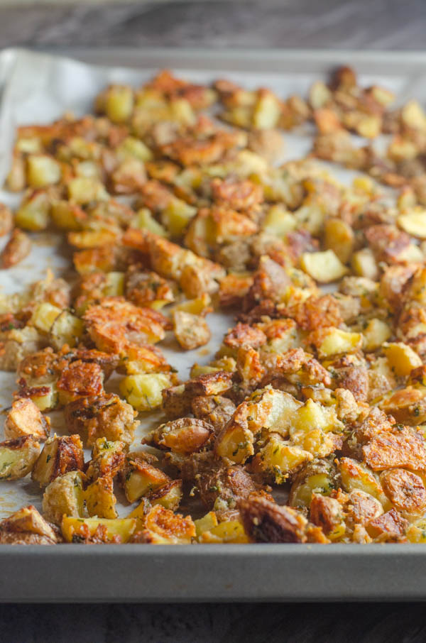 A delicious side dish, these super-crispy Parmesan potatoes are great for any night of the week! Gluten-free, grain-free, vegetarian, primal. 