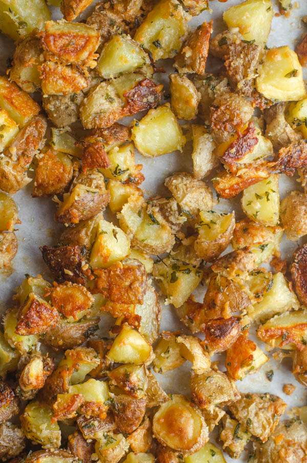 A delicious side dish, these super-crispy Parmesan potatoes are great for any night of the week! Gluten-free, grain-free, vegetarian, primal.