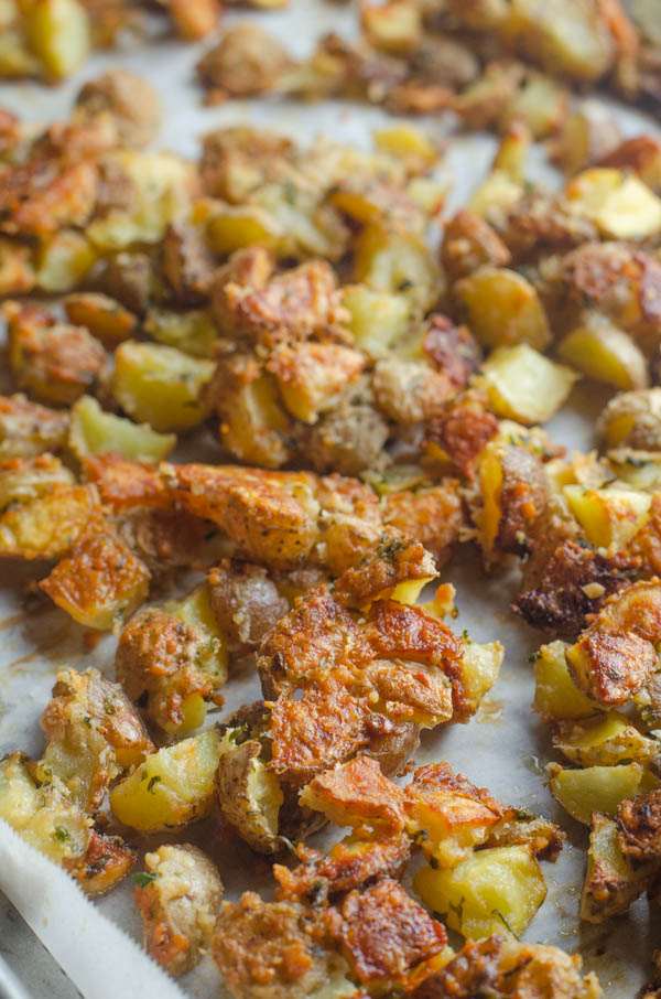 A delicious side dish, these super-crispy Parmesan potatoes are great for any night of the week! Gluten-free, grain-free, vegetarian, primal. 