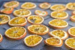 A simple, traditional holiday decoration or mulling spice recipe, these dehydrated orange slices are fun for the whole family!