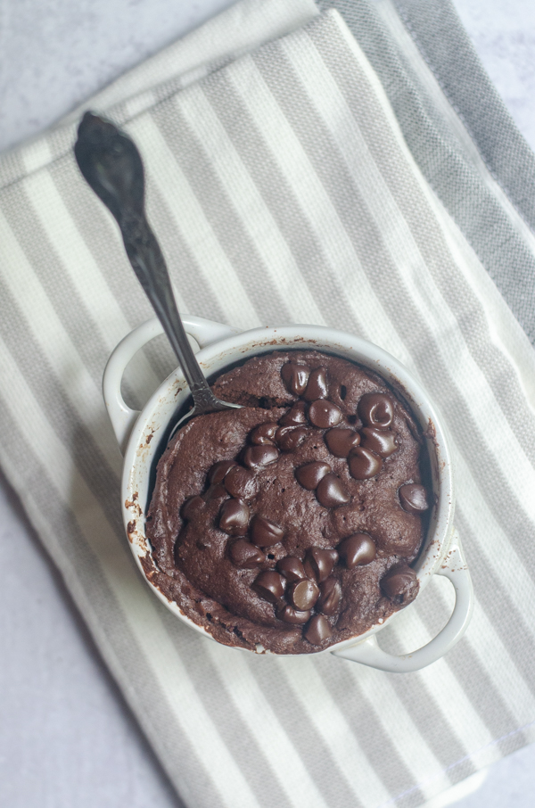 A double chocolate chip mug cake you can make in the microwave. Have dessert ready to eat in under 5 minutes, start to finish! No mess to clean up, and only one mug used! Gluten-free, grain-free, low-carb, Paleo, ketogenic. 