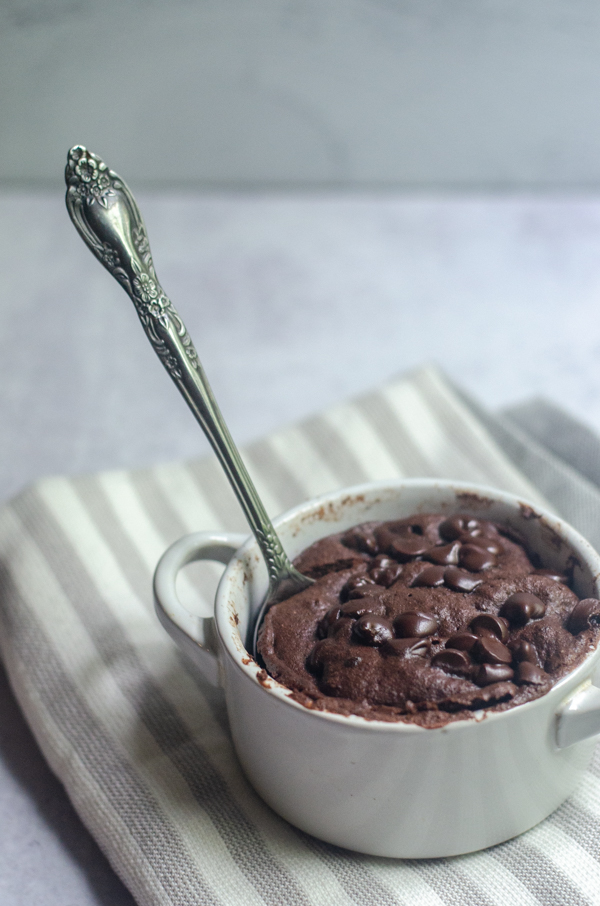 A double chocolate chip mug cake you can make in the microwave. Have dessert ready to eat in under 5 minutes, start to finish! No mess to clean up, and only one mug used! Gluten-free, grain-free, low-carb, Paleo, ketogenic. 