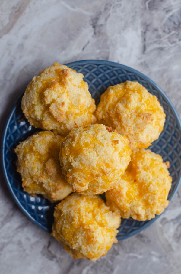 These gluten-free cheddar garlic biscuits are salty, crispy and soft and warm on the inside! Keto, low-carb, gluten-free, grain-free. 