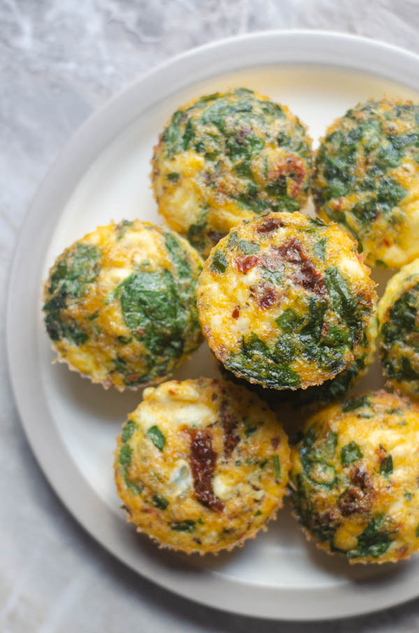 These Mediterranean egg cups are the perfect breakfast for busy mornings. You can make it ahead on the weekends and enjoy them throughout the entire week! Keto, grain-free. 