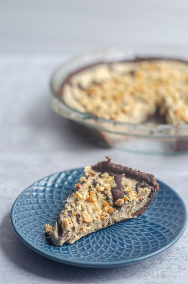 A fancy dessert you can make in just a few minutes of prep time, this peanut butter no-bake pie is super decadent! Paleo, keto, gluten-free.