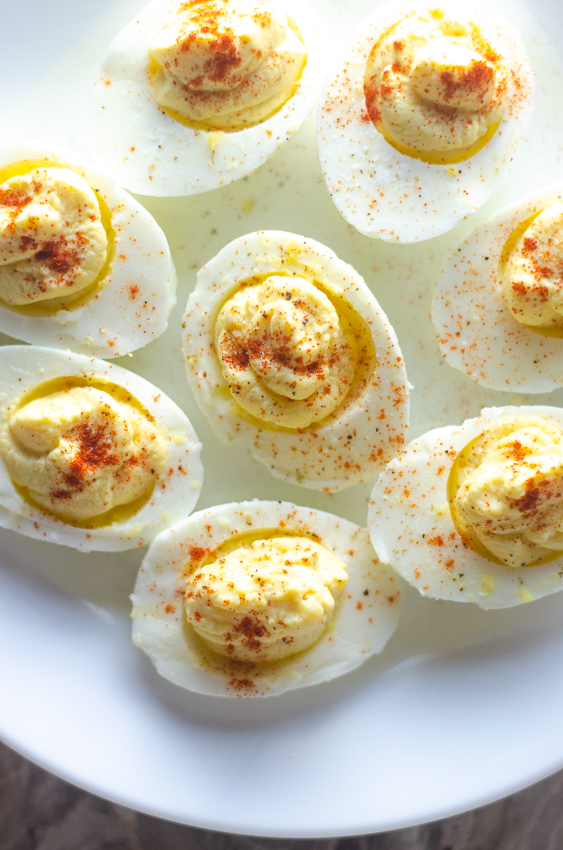 This healthy deviled egg recipe will please everyone at get-togethers! By switching just a few ingredients around, you can have keto, paleo and Whole30 friendly deviled eggs!