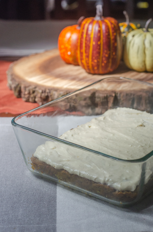 This pumpkin spice cake with cream cheese frosting is rich, sweet, tangy and perfect for a chilly fall evening! Gluten-free, animal-based.