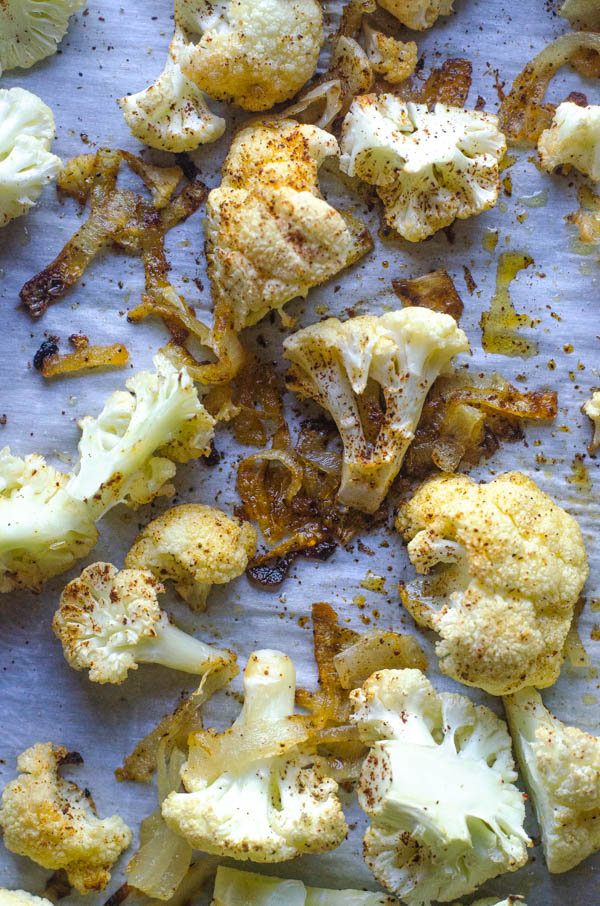 This super-tasty seasoned cauliflower with caramelized onions makes the perfect dinner side dish! Low-carb, paleo, Whole30, dairy-free, vegan.