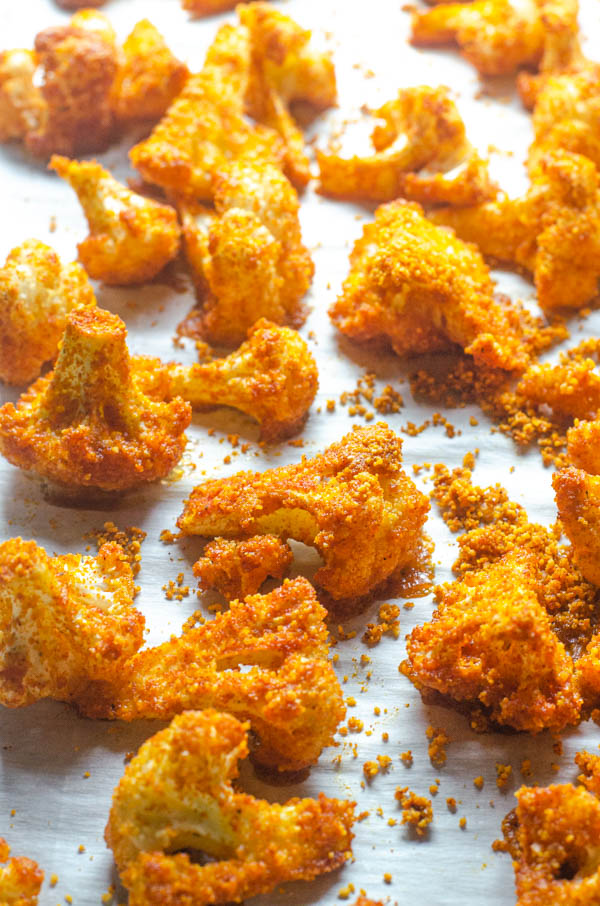 A delicious low-carb side dish or appetizer, these shake 'n bake cauliflower bites are easy to make and super tasty! Paleo, Whole30, vegan, keto. 