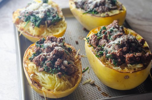 This spaghetti squash with meat sauce is a healthy alternative to a carb-filled dinner. Low-carb, paleo, whole30, gluten-free, grain-free, dairy-free.