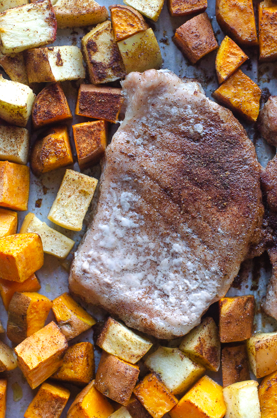 Looking for a hearty, healthy meal for colder weather? These sheet pan spiced pork chops and veggies are an easy and delicious meal! Paleo, Whole30, gluten-free, grain-free.