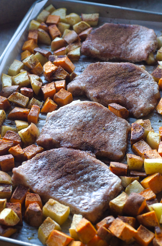 Looking for a hearty, healthy meal for colder weather? These sheet pan spiced pork chops and veggies are an easy and delicious meal! Paleo, Whole30, gluten-free, grain-free.