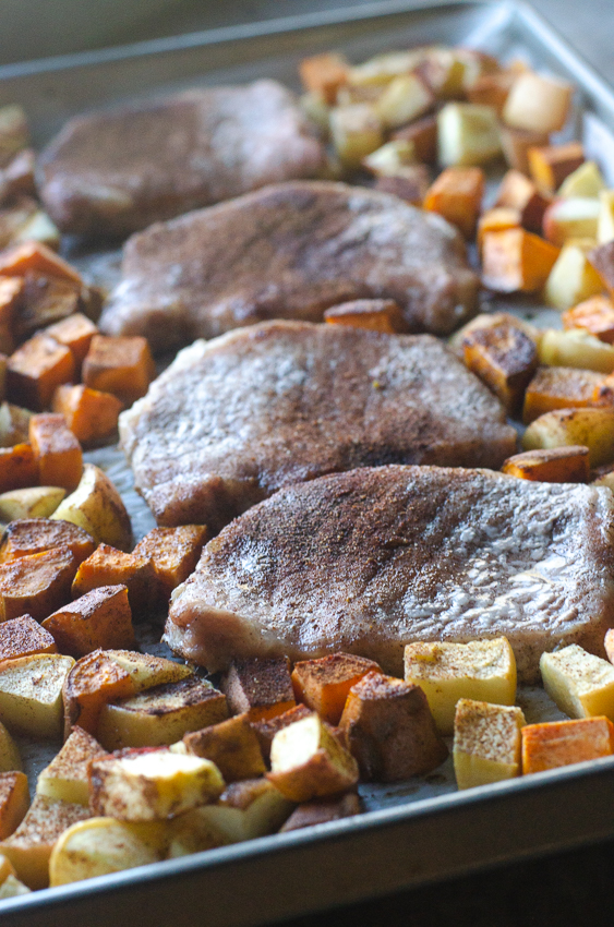 Looking for a hearty, healthy meal for colder weather? These sheet pan spiced pork chops and veggies are an easy and delicious meal! Paleo, Whole30, gluten-free, grain-free. 