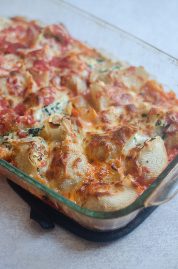 These gluten-free vegetarian stuffed shells are a crowd pleaser that everyone can enjoy! Easy to make and very filling, they're a hearty, delicious comfort food.