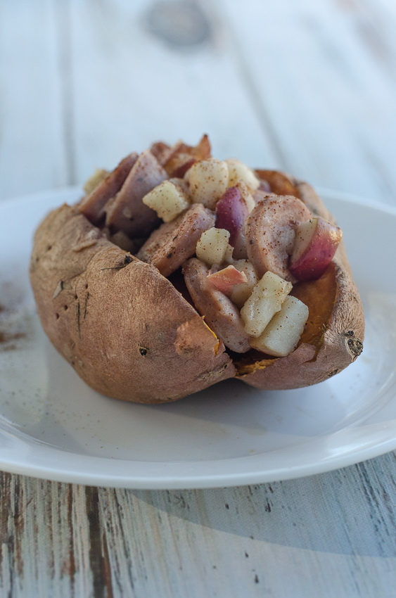 A delicious fall favorite, these stuffed sweet potatoes are loaded with apples, sweet chicken sausage and cinnamon butter! Paleo, Whole30, dairy-free, gluten-free, grain-free. 