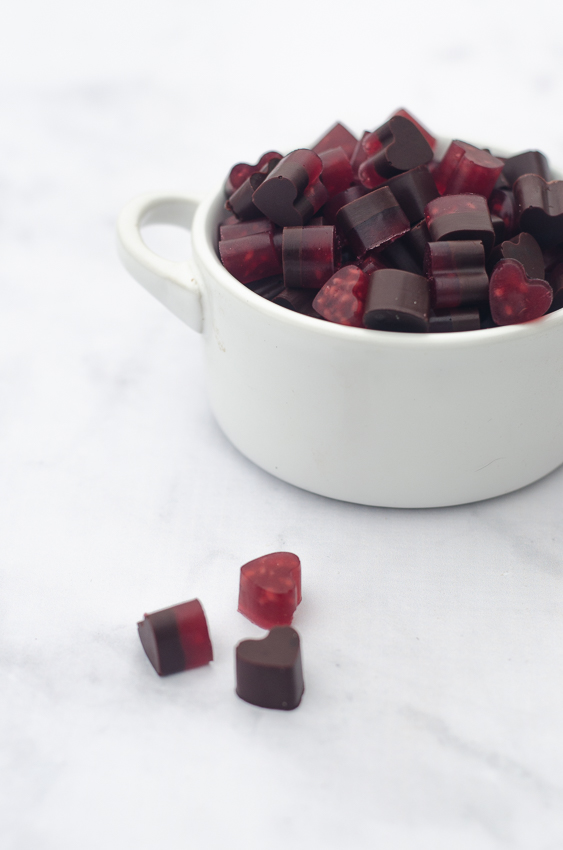 These raspberry chocolate gummy bears are the perfect Valentine's day treat! They are sweet, chewy and free of sugars, carbs and preservatives! Keto, low-carb, Paleo.